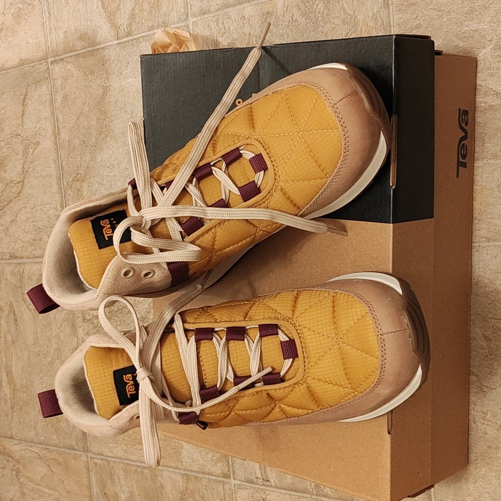 Teva boots that are a size 8 brand new in tan and light gold.